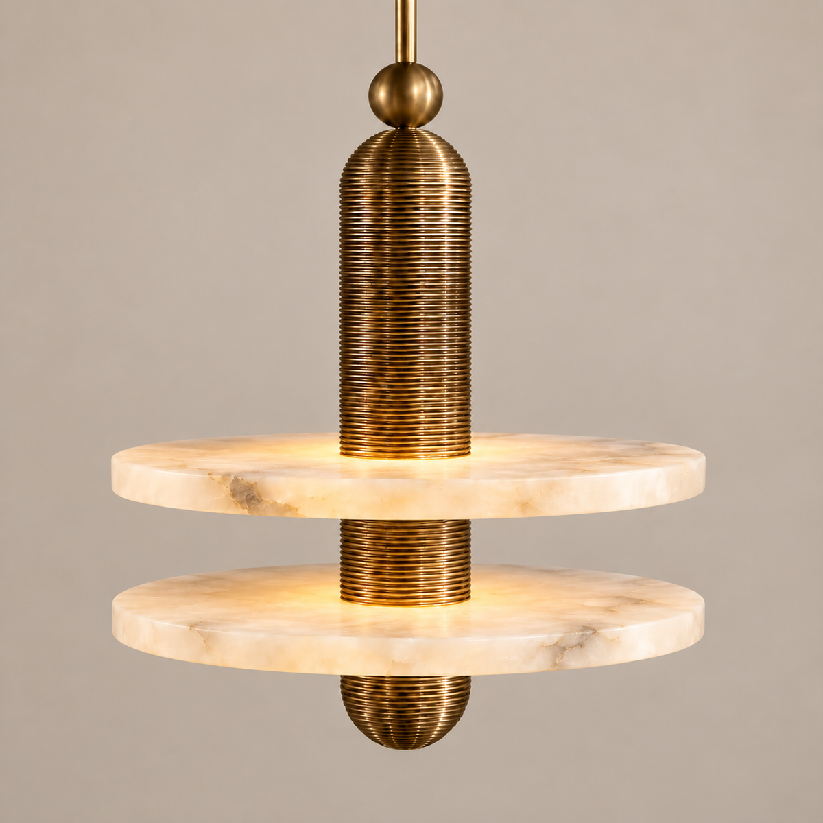 Volto alabaster and brass pendant illuminated with visible mineral clouds