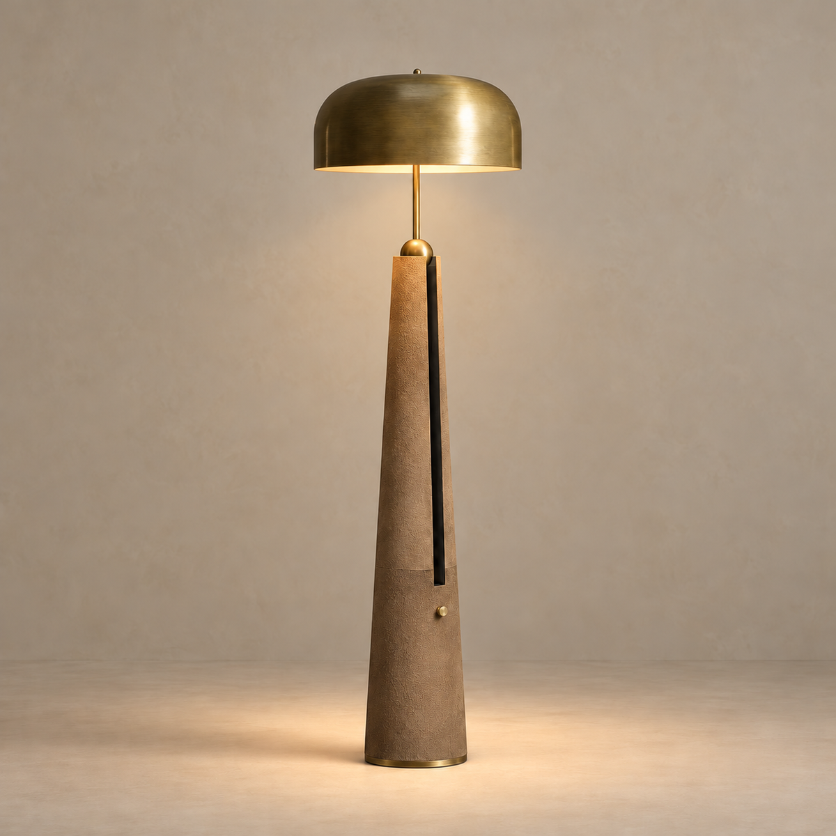 Trastevere floor lamp casting warm downward light beneath its opaque brass dome.