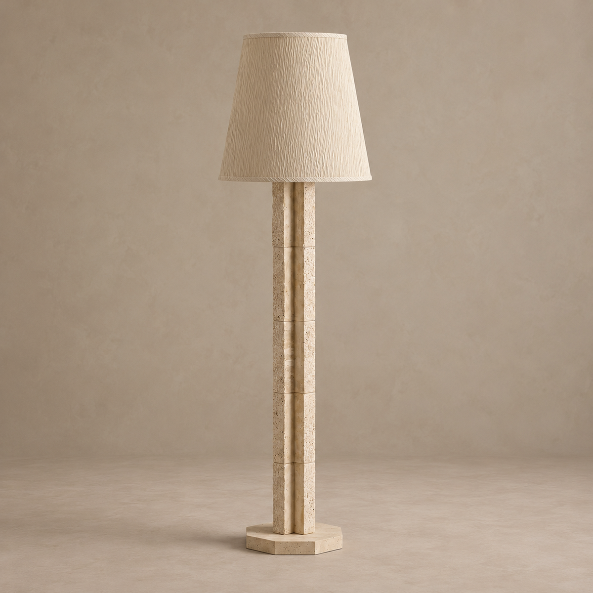 CLJFR53 floor lamp switched off, with a crinkled fabric shade, stacked travertine column and octagonal base.