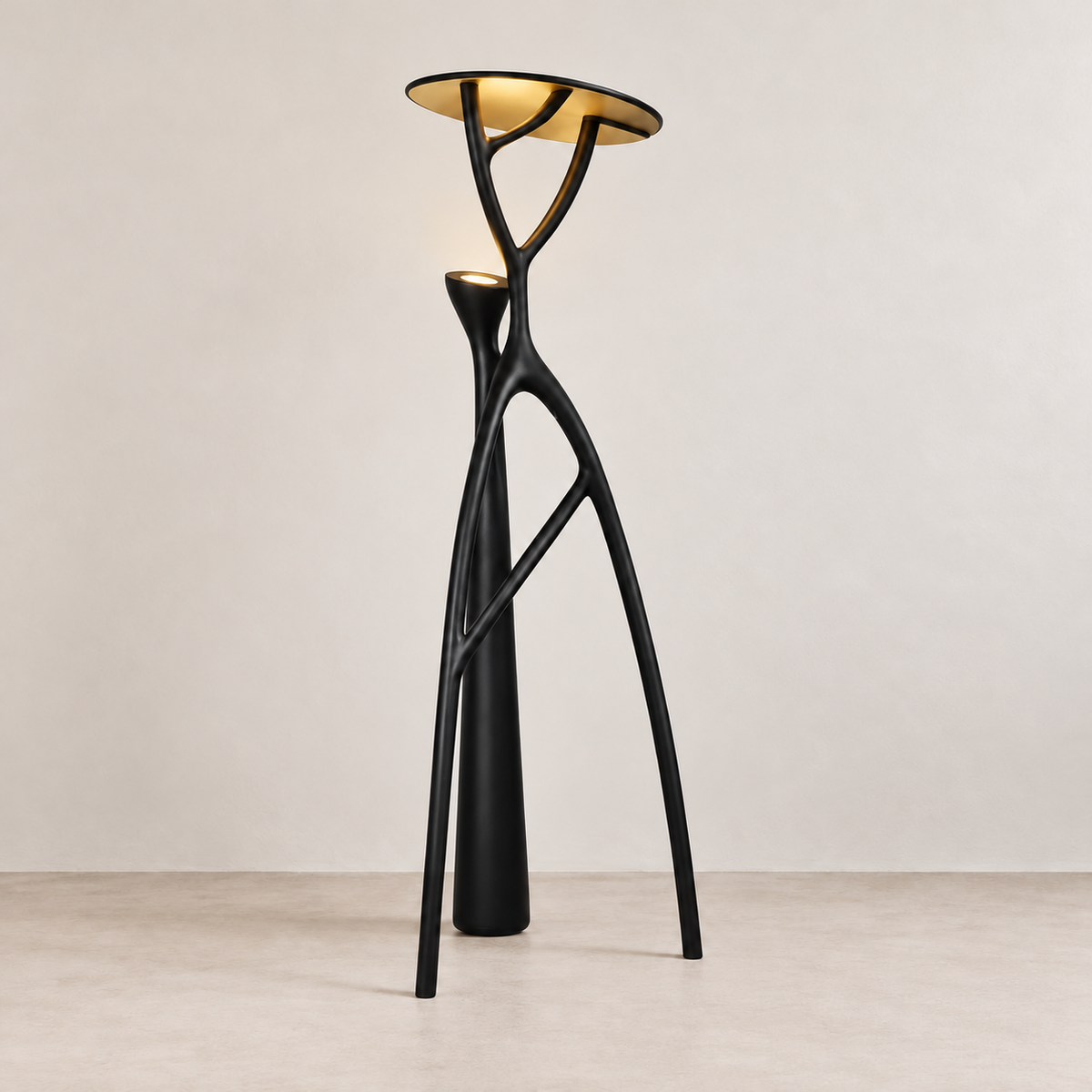 Tree floor lamp illuminated, with light reflected from the gold underside of its canopy.