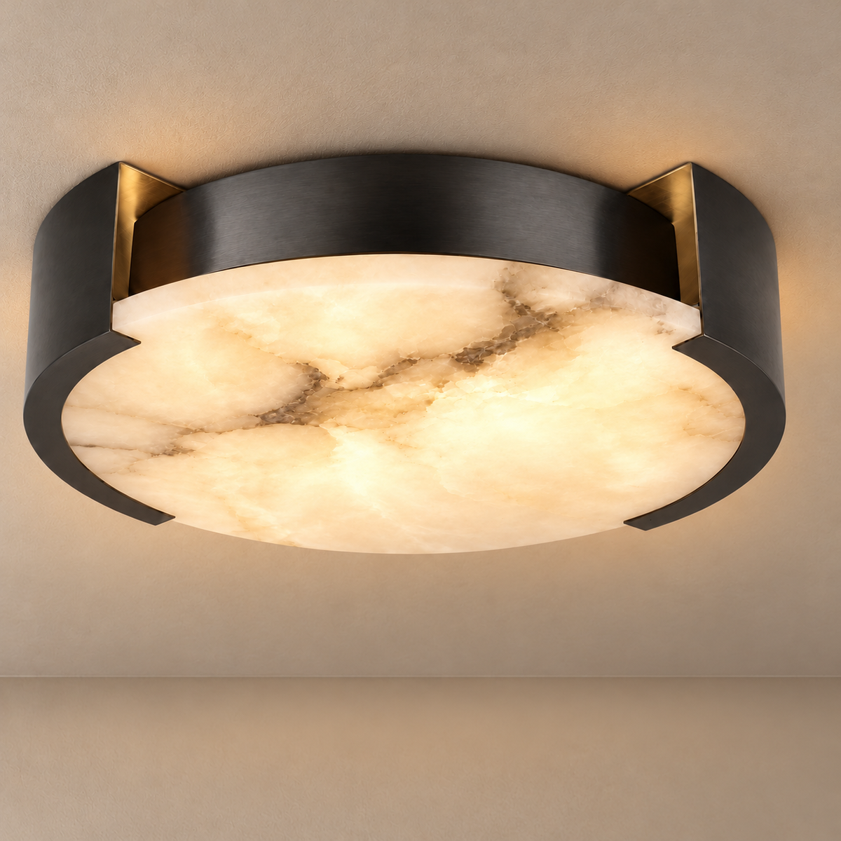 Velatura black alabaster flush mount illuminated, with natural mineral bands visible through the stone.