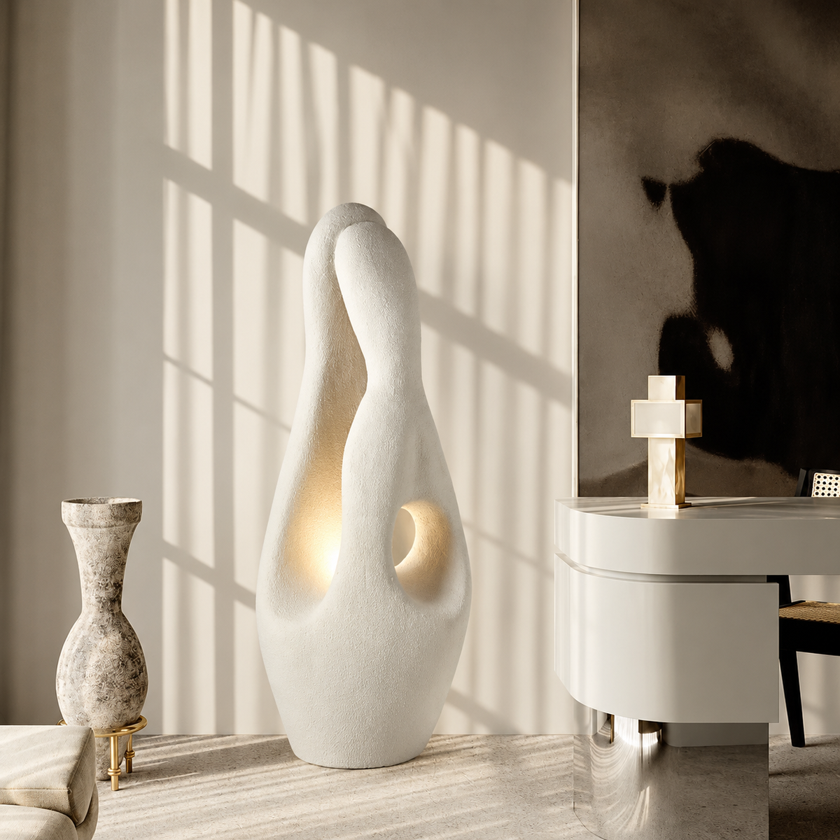 Illuminated CLK852220 floor lamp beside a curved desk and abstract artwork