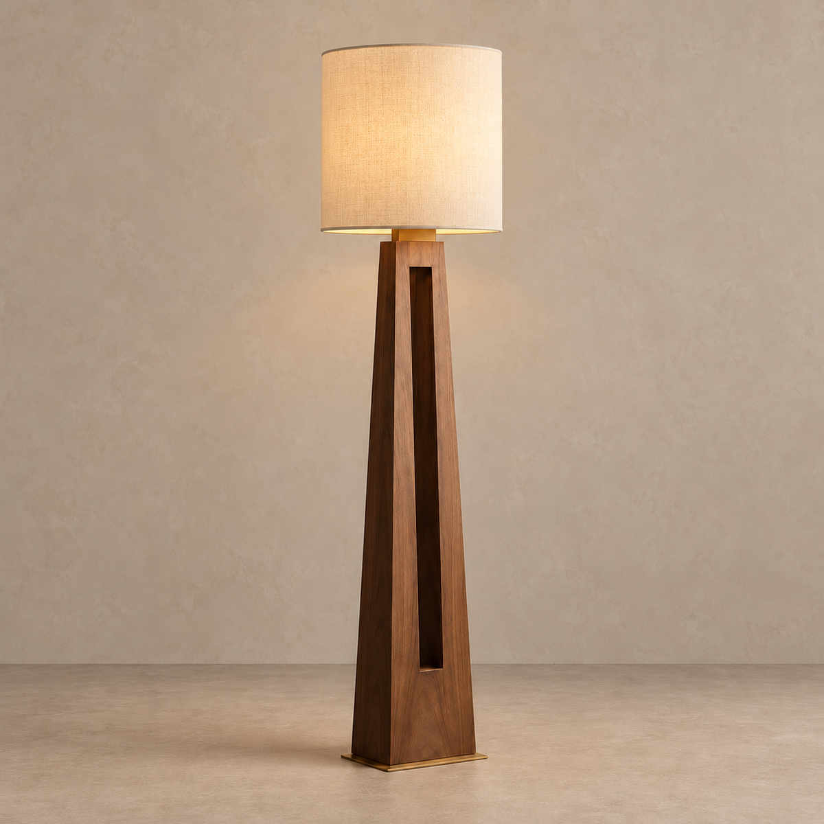 CLSSK6002 floor lamp illuminated through its linen shade above the walnut column.