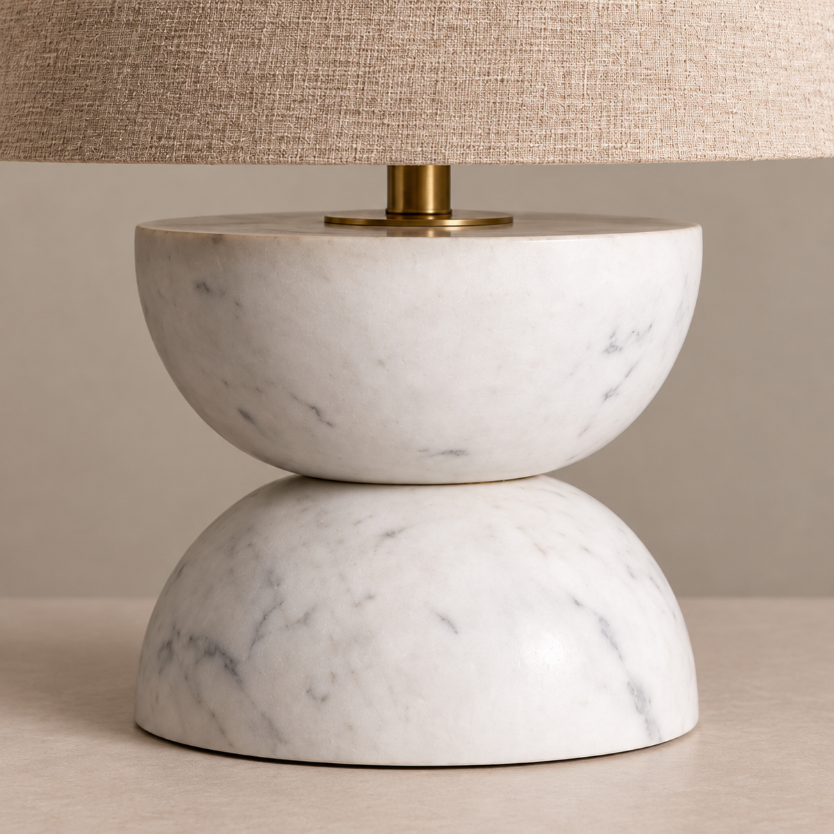 Detail of Zana's marble hemispheres and brass shade support